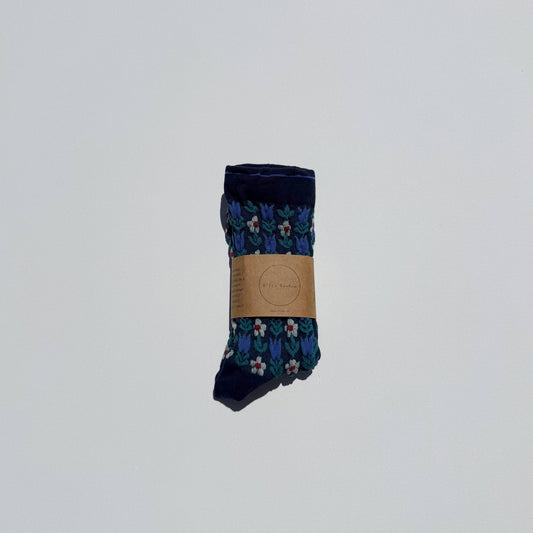 Pair of socks with a floral pattern on a white background
